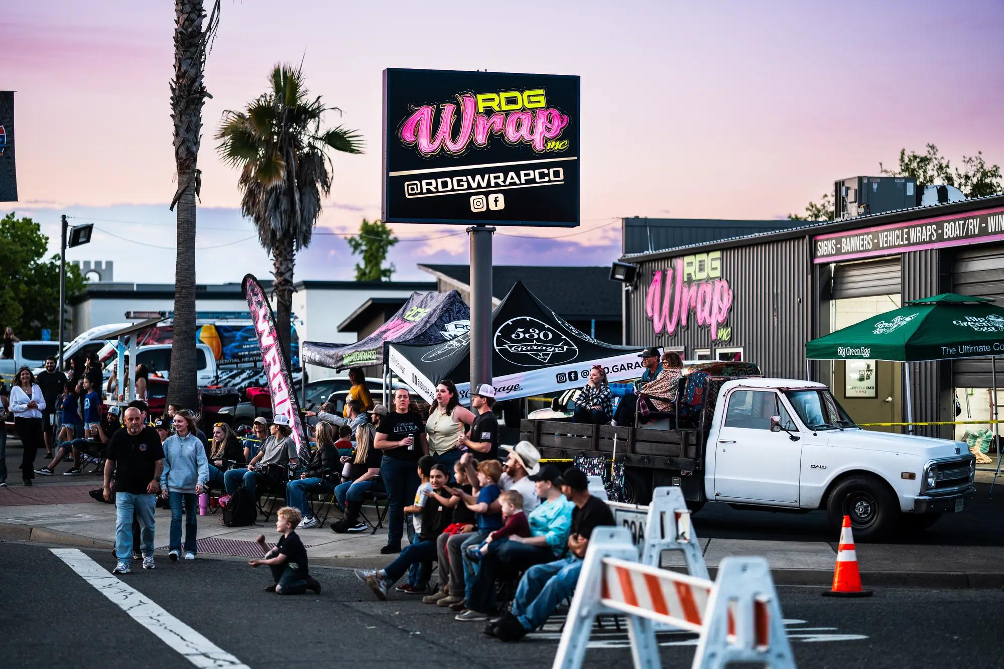Crowd gathered in front of the shop for the Kool April Nights block party